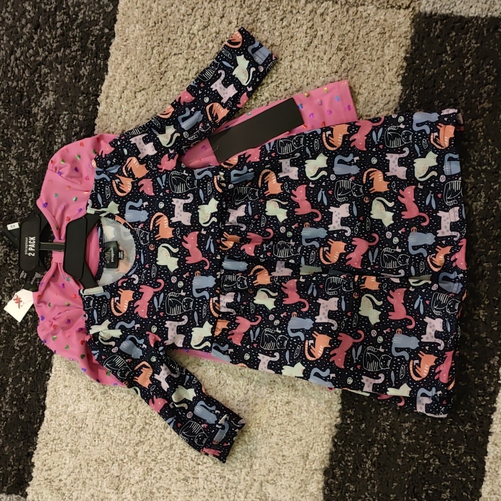 2 dress set. One blue dress and one pink dress.